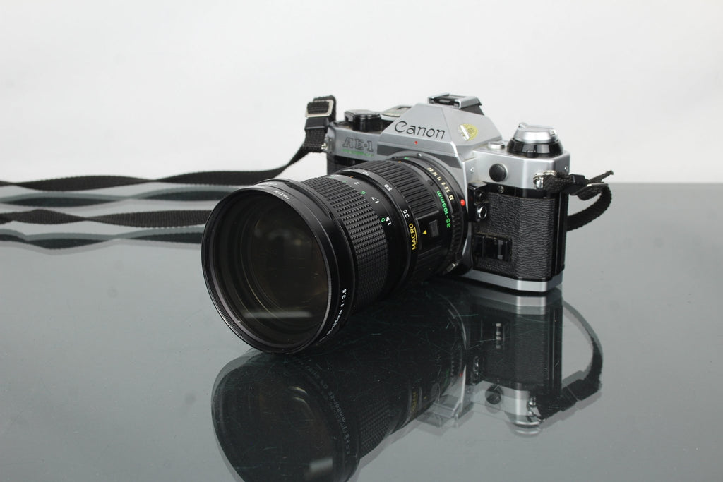Canon AE - 1 Program + 35 - 105mm 1:3.5 Canon lens - Dutch|Thrift