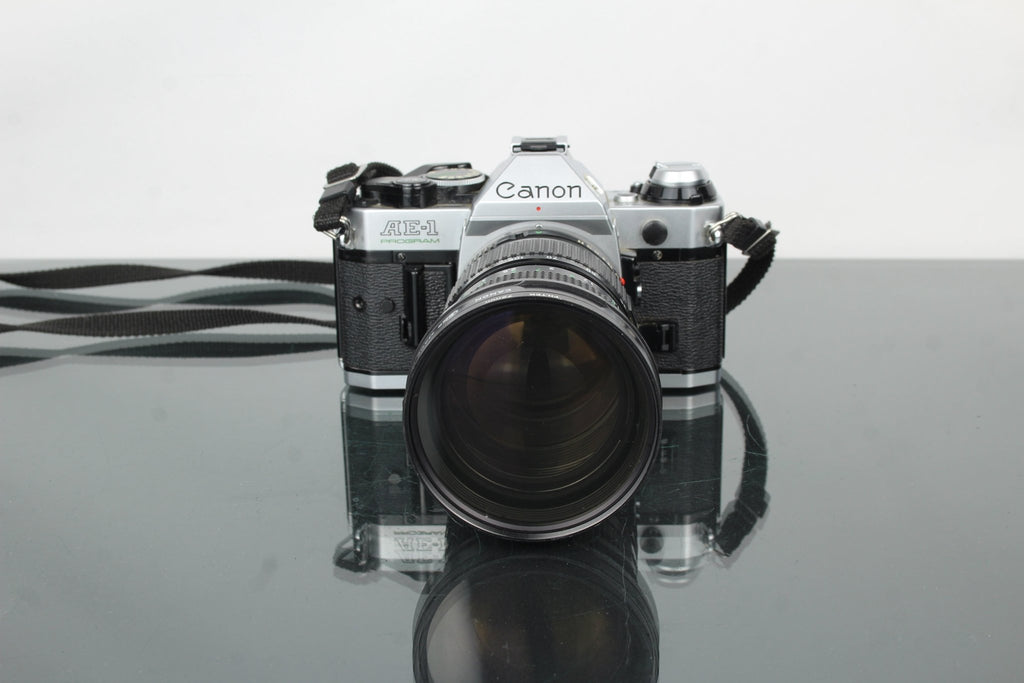 Canon AE - 1 Program + 35 - 105mm 1:3.5 Canon lens - Dutch|Thrift