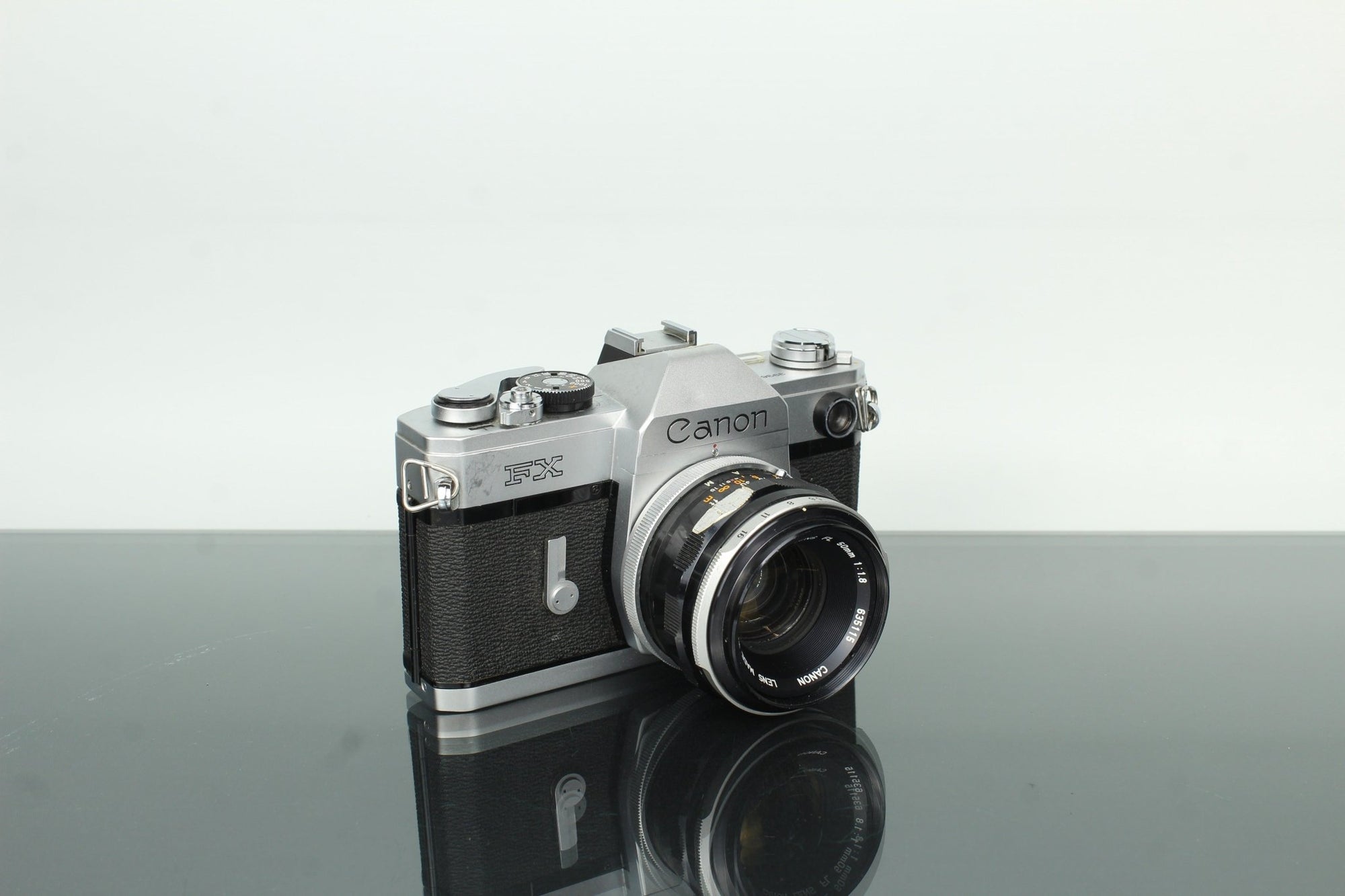 Canon FX + Canon FL 50mm f/1.8 - Dutch|Thrift