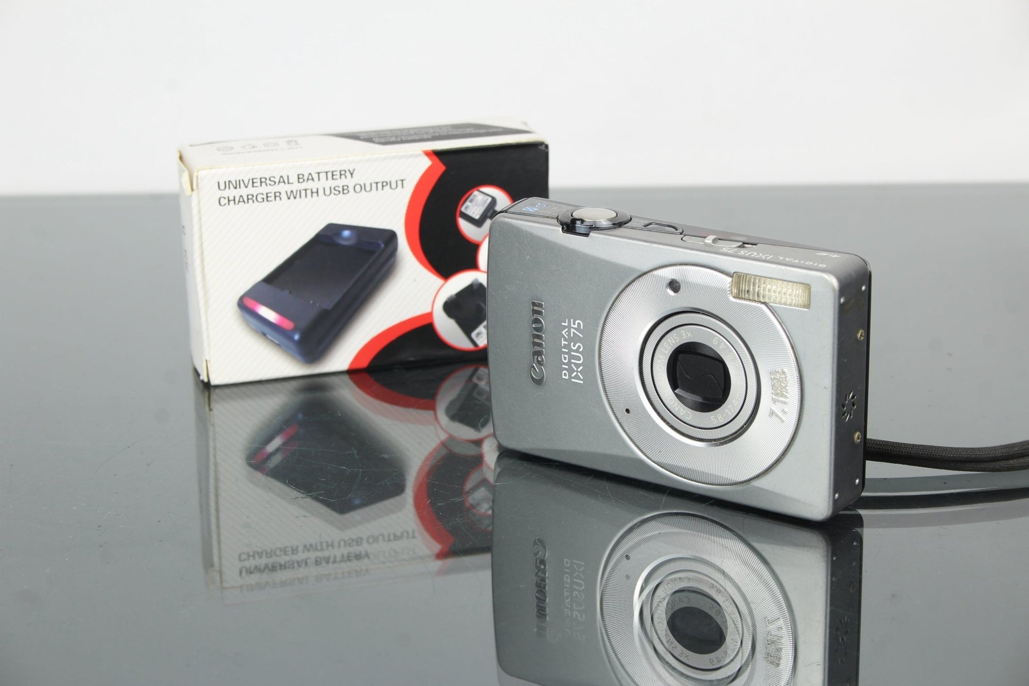 Canon IXUS 75 - Dutch|Thrift