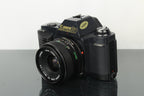 Canon T50 - Dutch|Thrift