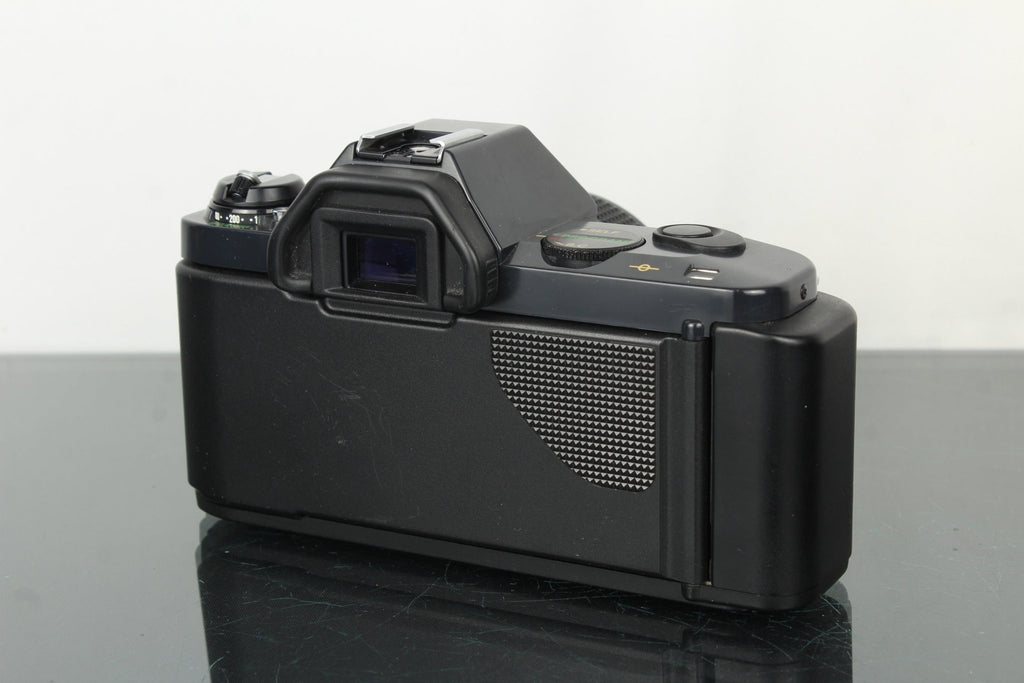 Canon T50 - Dutch|Thrift