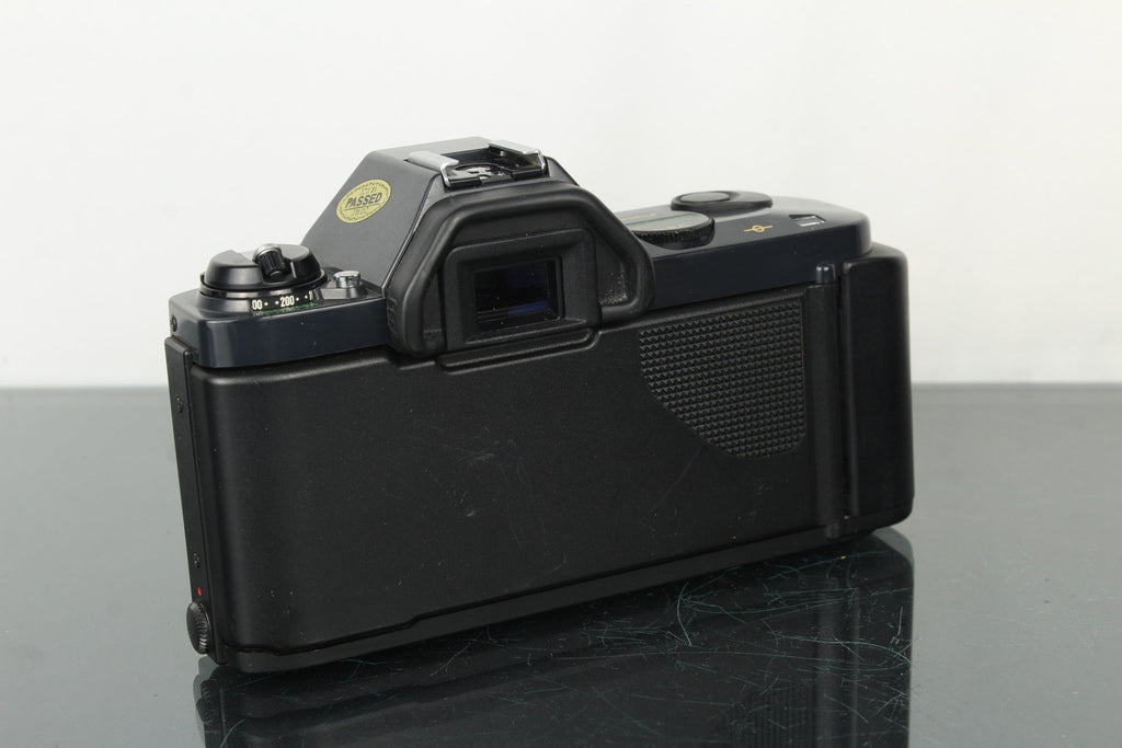 Canon T50 - Dutch|Thrift