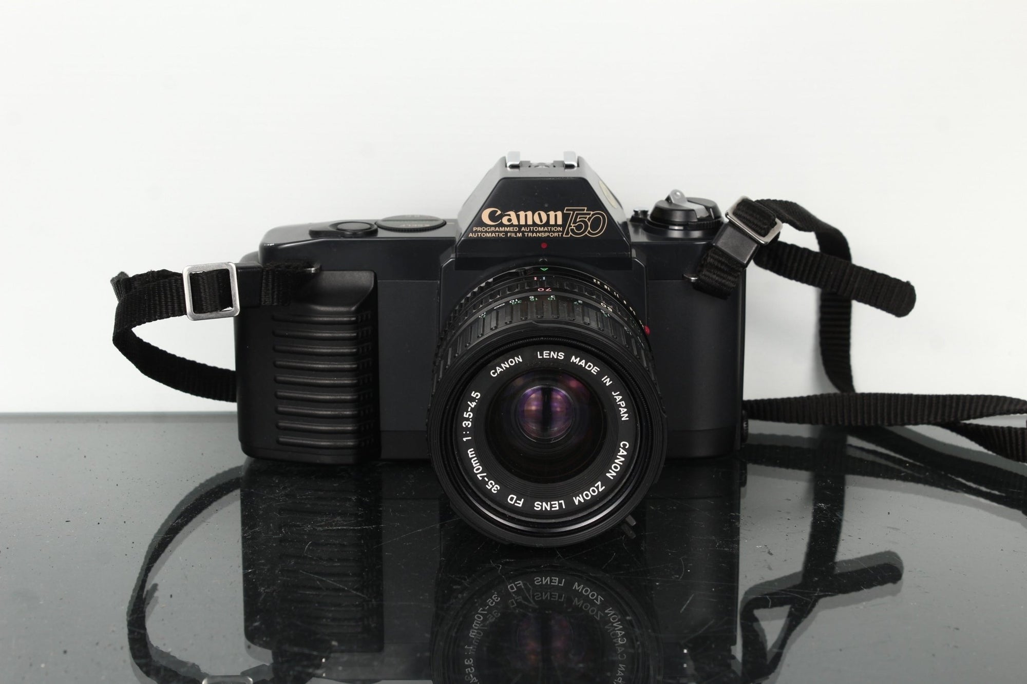 Canon T50 + Canon Zoom Lens FD 35 - 70mm 1:3.5 - 4.5 - Dutch|Thrift