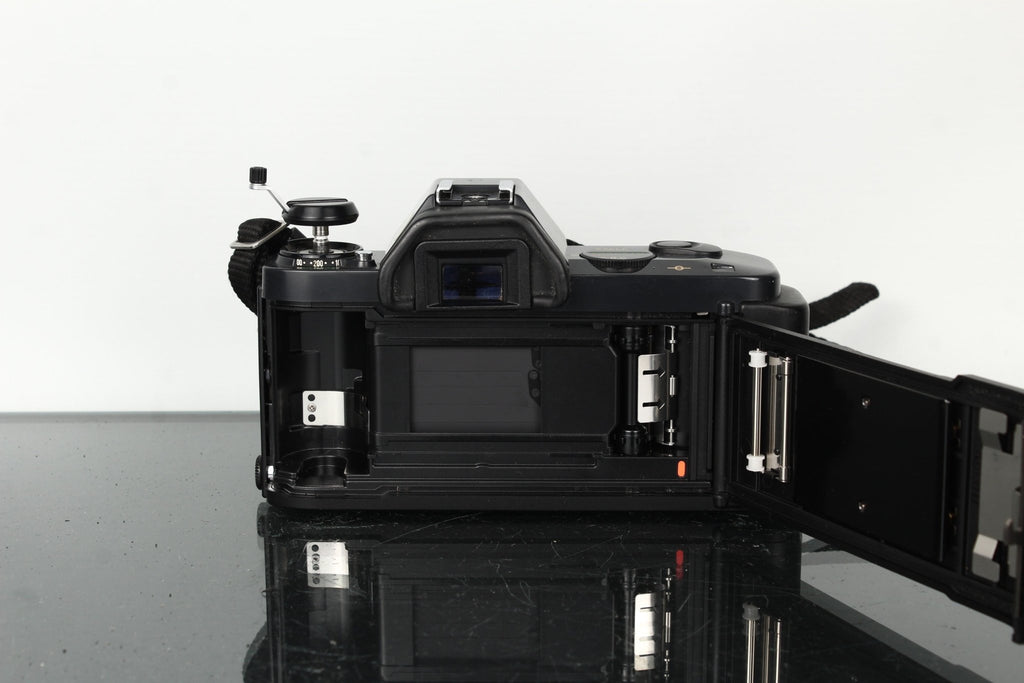 Canon T50 + Canon Zoom Lens FD 35 - 70mm 1:3.5 - 4.5 - Dutch|Thrift