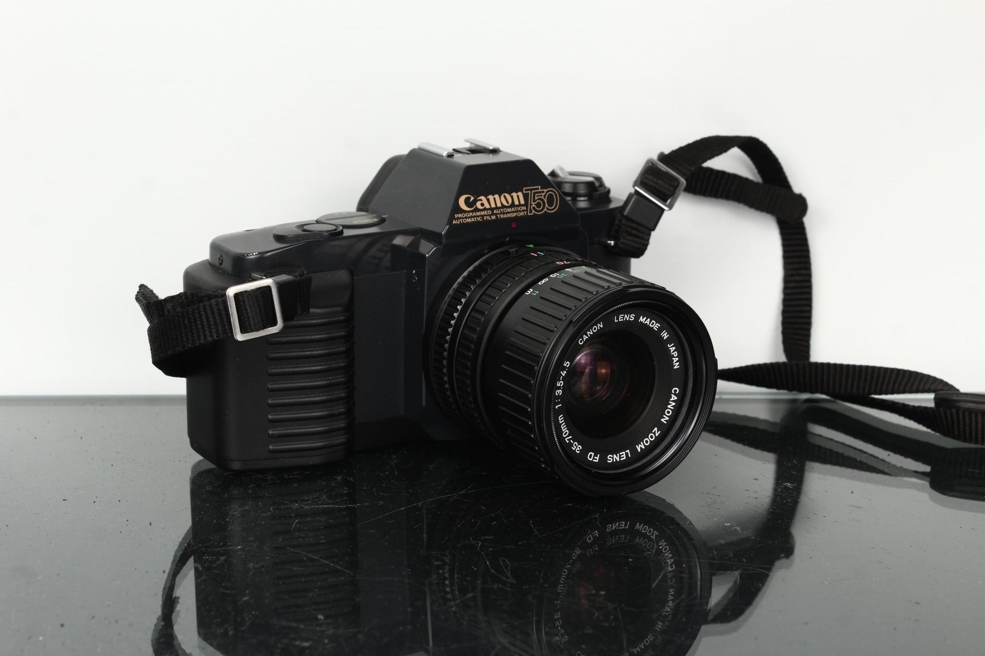 Canon T50 + Canon Zoom Lens FD 35 - 70mm 1:3.5 - 4.5 - Dutch|Thrift