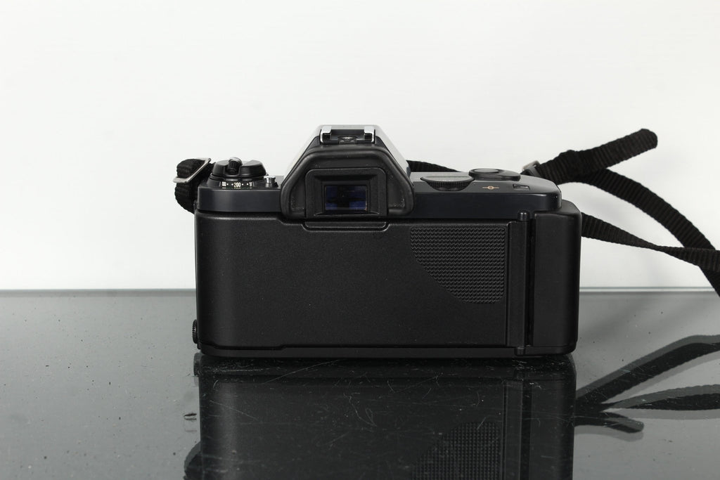 Canon T50 + Canon Zoom Lens FD 35 - 70mm 1:3.5 - 4.5 - Dutch|Thrift