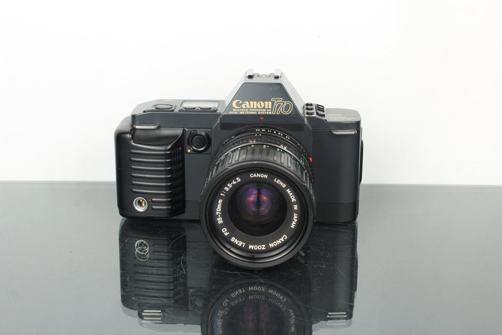 Canon T70 + Canon FD 35 - 70mm 1:3.5 - 4.5 lens (FD Mount) - Dutch|Thrift