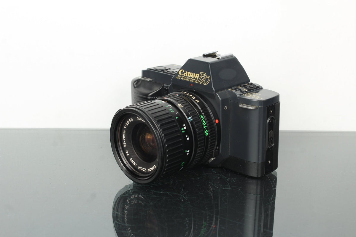 Canon T70 + Canon FD 35 - 70mm 1:3.5 - 4.5 lens (FD Mount) - Dutch|Thrift