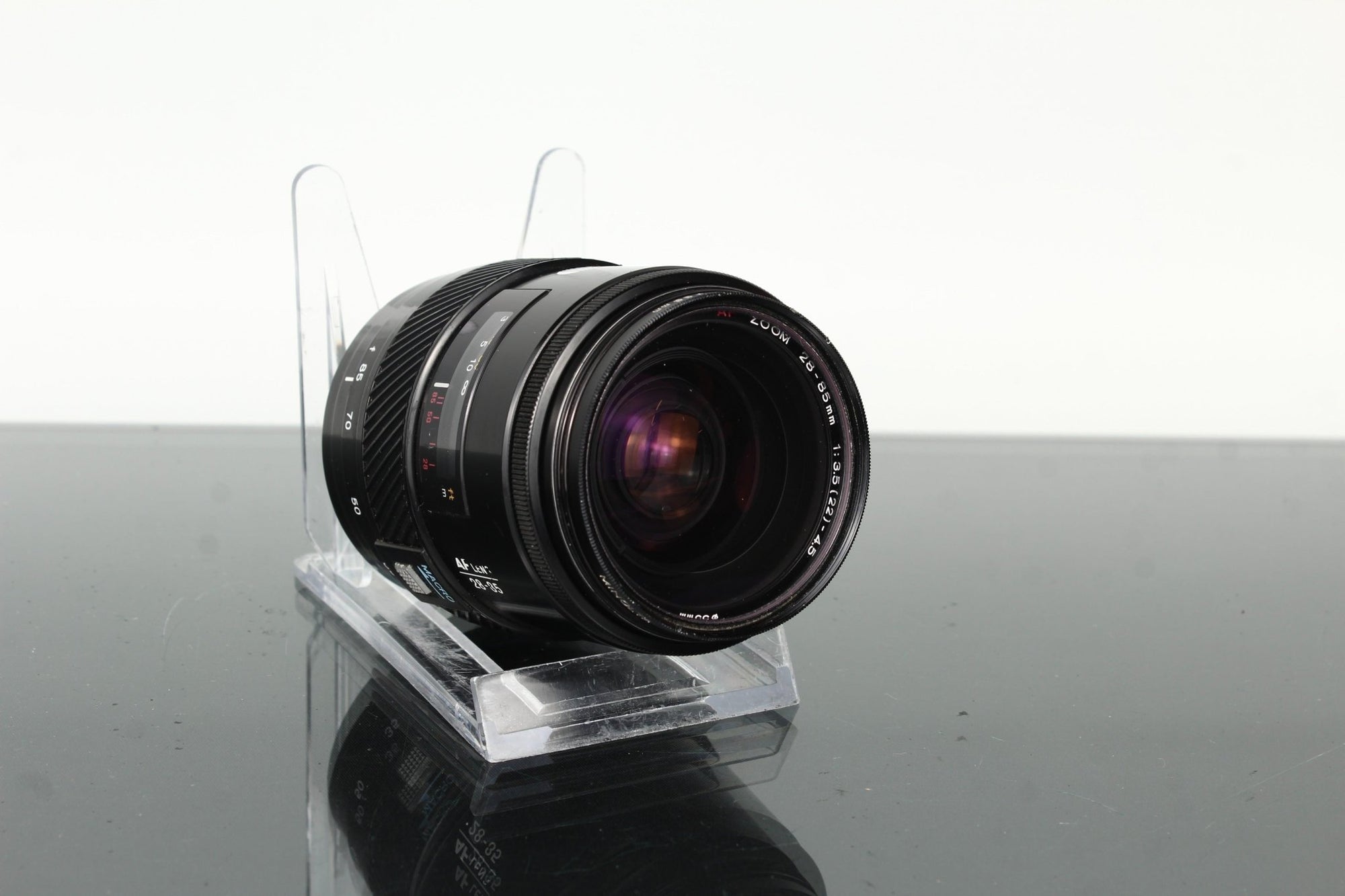 Minolta AF 28 - 85mm 1:3.5 - 4.5 + Minolta AC 1B Skylight - Dutch|Thrift