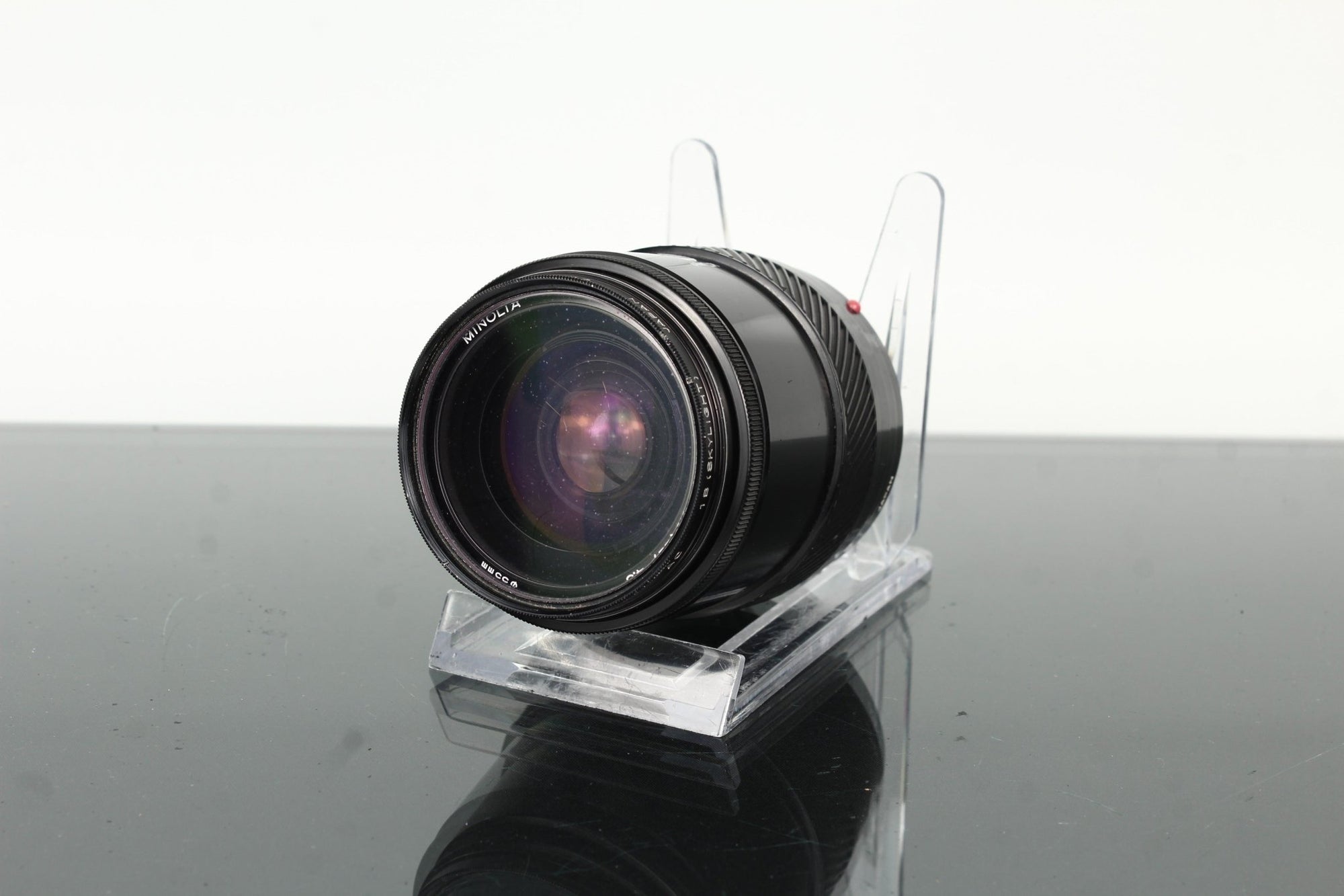 Minolta AF 28 - 85mm 1:3.5 - 4.5 + Minolta AC 1B Skylight - Dutch|Thrift