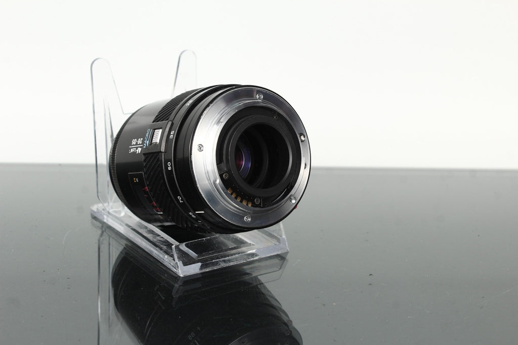 Minolta AF 28 - 85mm 1:3.5 - 4.5 + Minolta AC 1B Skylight - Dutch|Thrift