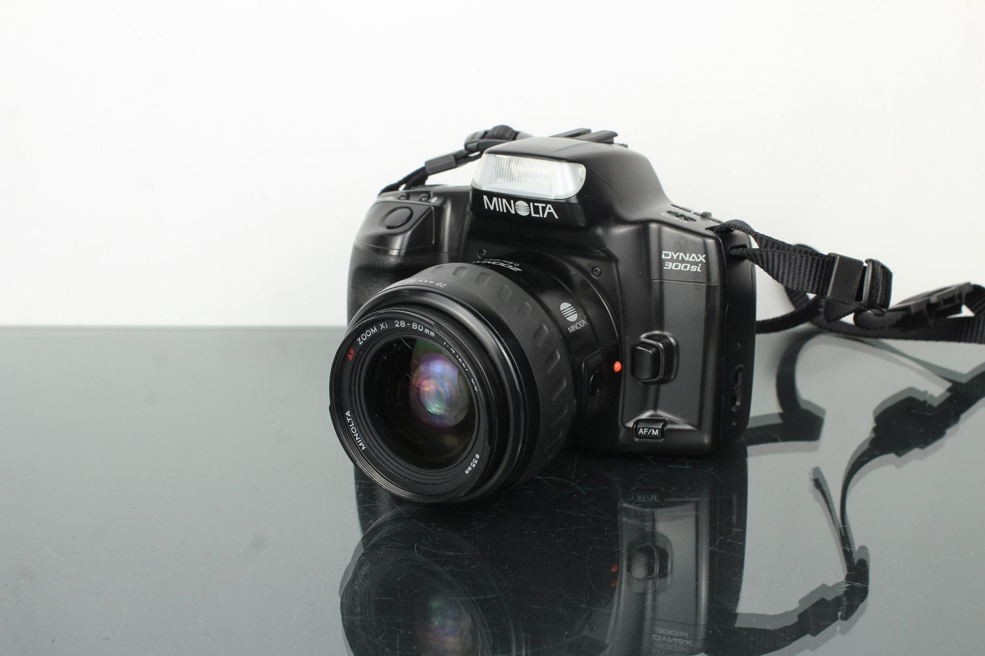 Minolta Dynax 300Si + Minolta AF Zoom Xi 28 - 80mm 4 - 5.6 - Dutch|Thrift