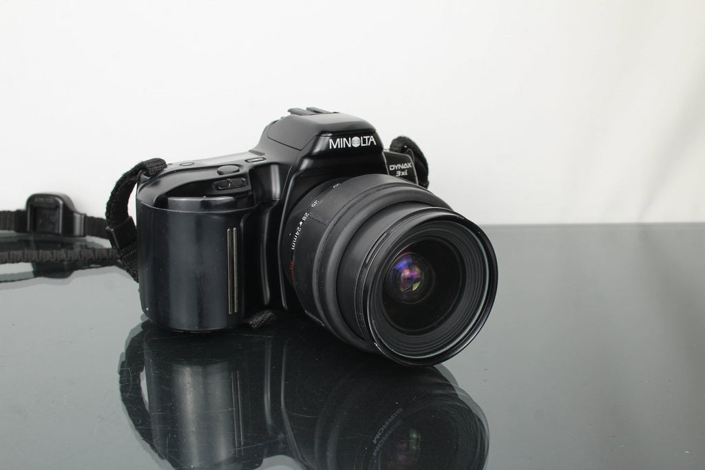 Minolta Dynax 3xi + 24 - 70mm 1:3.3 - 5.6 Minolta AF lens - Dutch|Thrift
