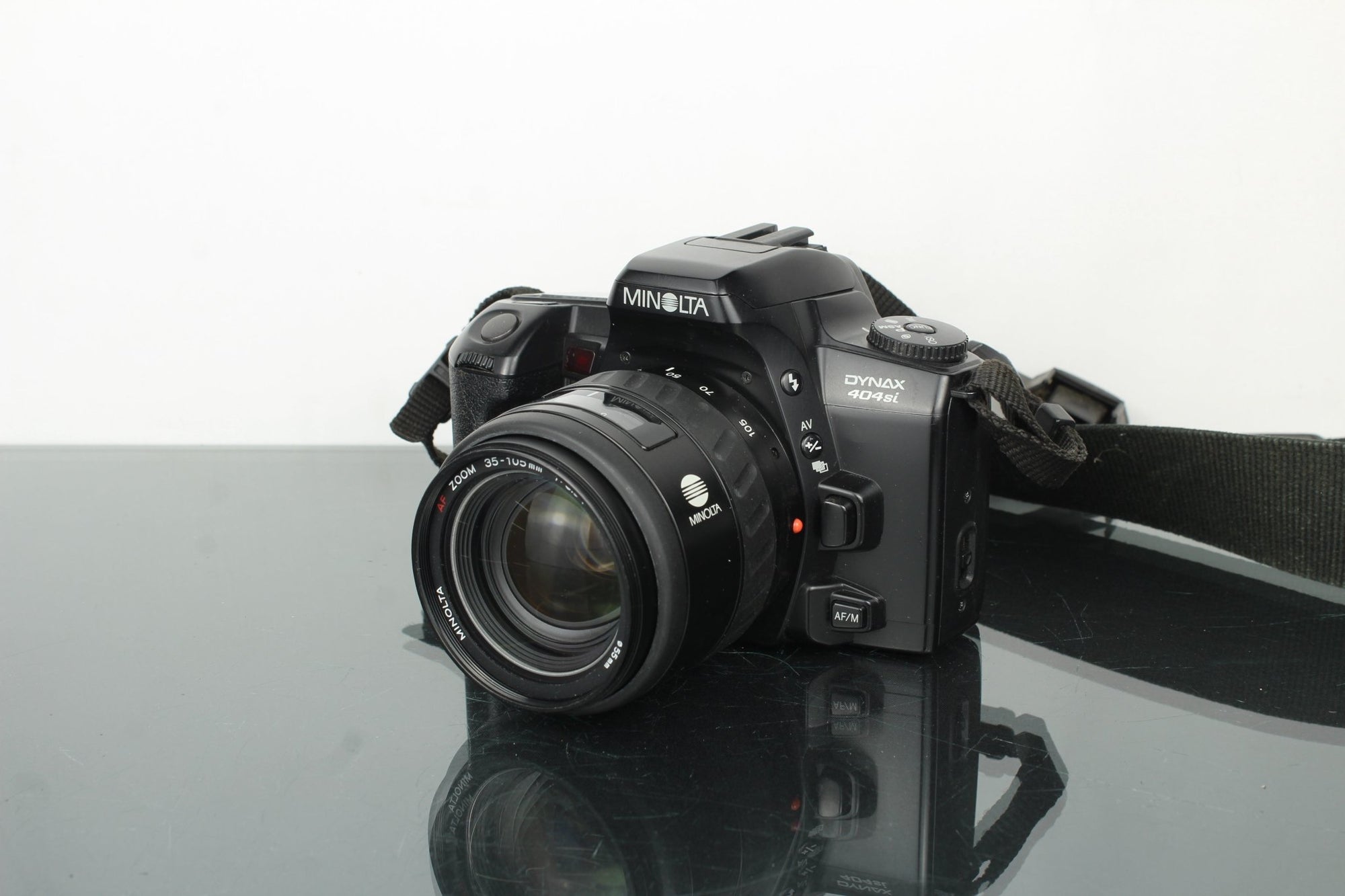 Minolta Dynax 404Si + Minolta AF Zoom 35 - 105mm 3.5 - 4.5 lens - Dutch|Thrift