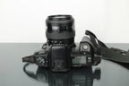 Minolta Dynax 404Si + Minolta AF Zoom 35 - 105mm 3.5 - 4.5 lens - Dutch|Thrift