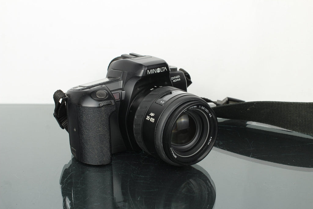 Minolta Dynax 404Si + Minolta AF Zoom 35 - 105mm 3.5 - 4.5 lens - Dutch|Thrift