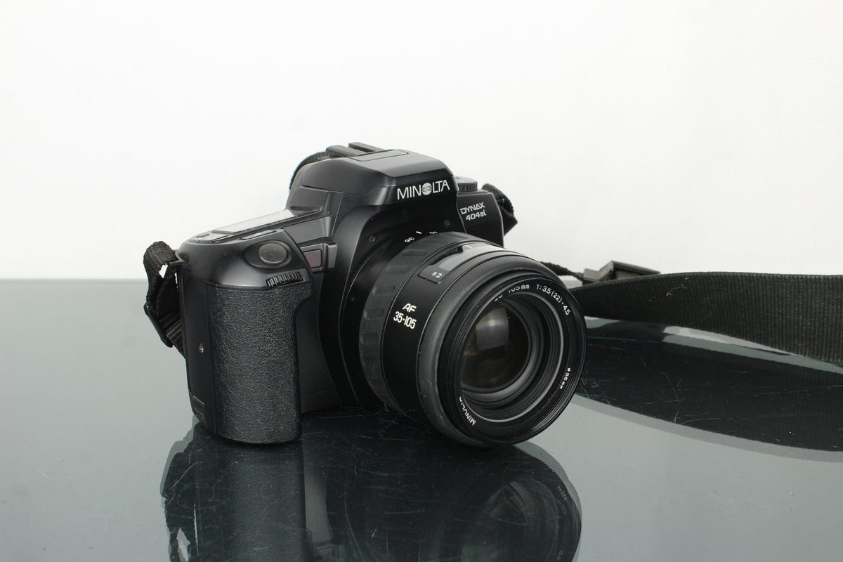 Minolta Dynax 404Si + Minolta AF Zoom 35 - 105mm 3.5 - 4.5 lens - Dutch|Thrift