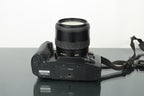 Minolta Dynax 404Si + Minolta AF Zoom 35 - 105mm 3.5 - 4.5 lens - Dutch|Thrift