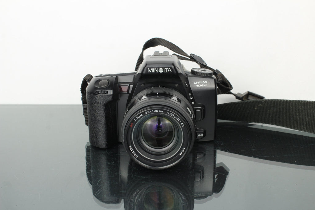 Minolta Dynax 404Si + Minolta AF Zoom 35 - 105mm 3.5 - 4.5 lens - Dutch|Thrift