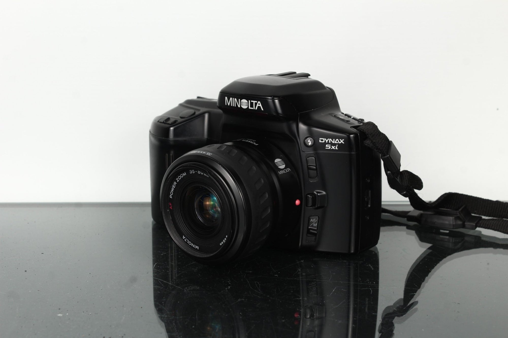 Minolta Dynax 5xi + Minolta Power Zoom 35 - 80mm 1:4 - 5.6 - Dutch|Thrift