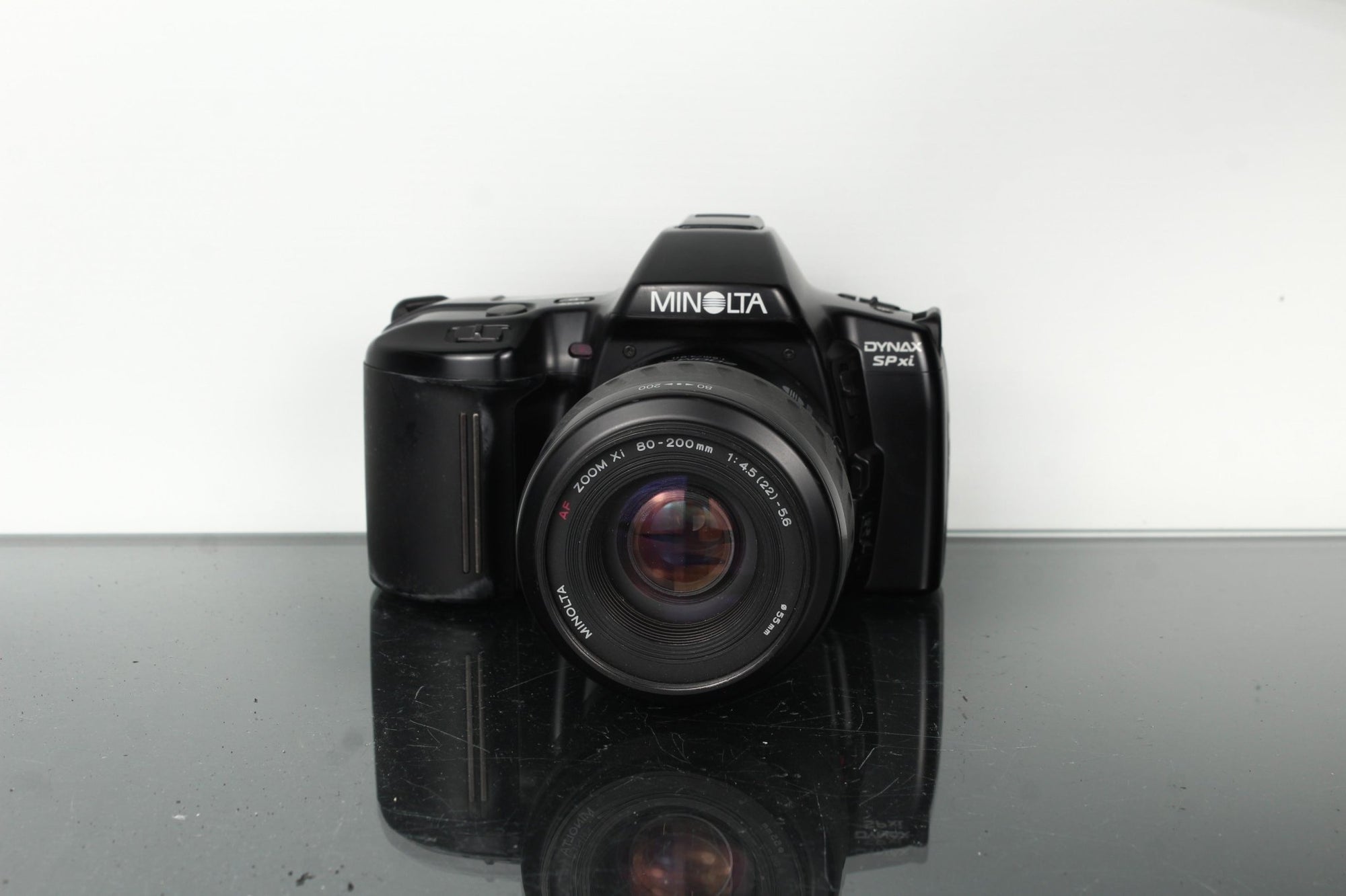 Minolta Dynax SPxi + AF Zoom XI 80 - 200mm - Dutch|Thrift