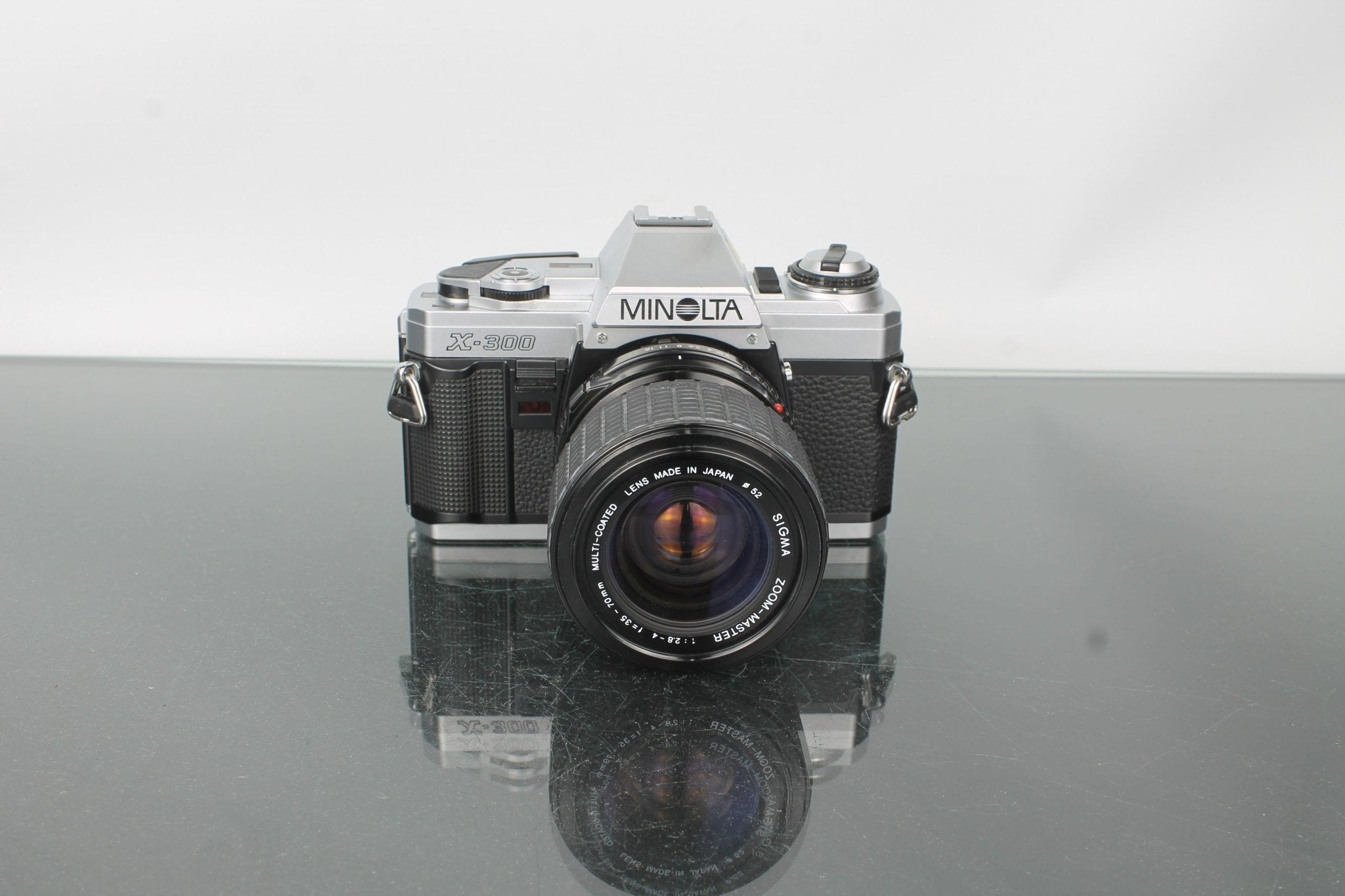 Minolta X-300 35mm Film SLR Camera with Sigma 28-70mm Lens – Dutch