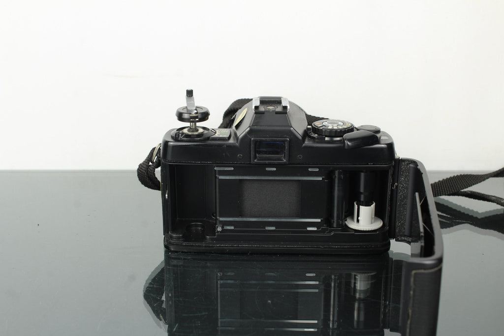 Minolta XG - E + Minolta MD 35 - 70mm 1:3.5 lens - Dutch|Thrift