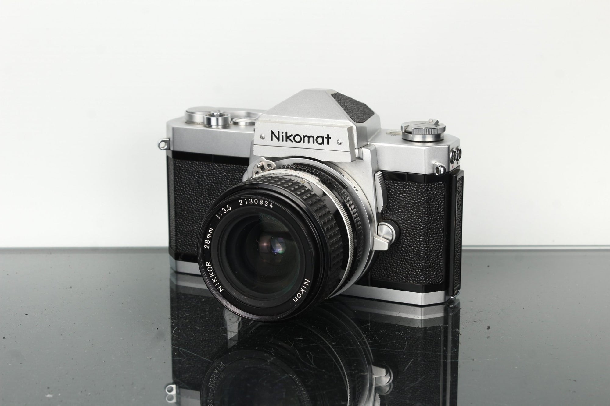 Nikkormat FT 3833076 + Nikon 28mm 1:3.5 - Dutch|Thrift