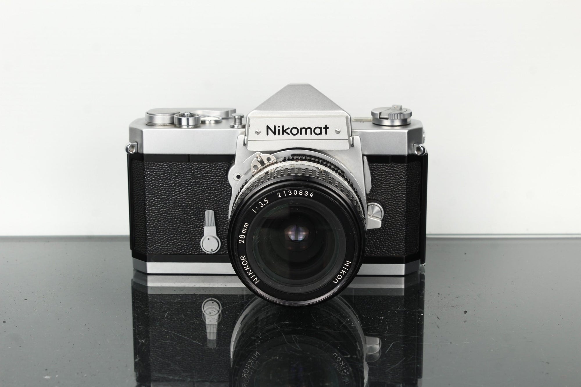 Nikkormat FT 3833076 + Nikon 28mm 1:3.5 - Dutch|Thrift