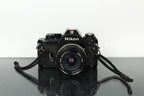 Nikon EM + Nikon E 28mm 1:2.8 - Dutch|Thrift