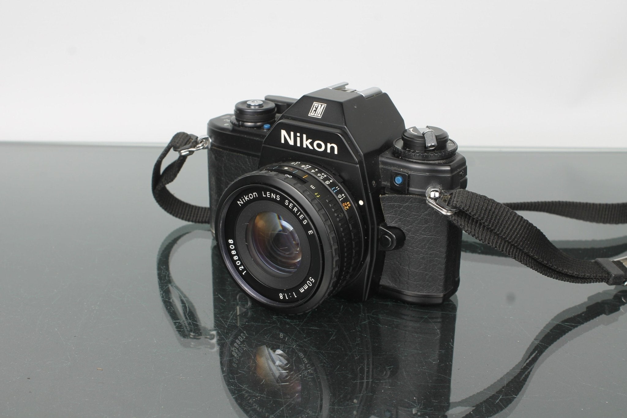 Nikon EM SLR Film Camera with Nikon E Series 50mm f/1.8 Lens