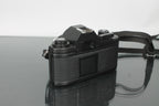 Nikon EM + Nikon E 50mm 1:1.8 - Dutch|Thrift