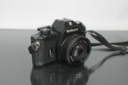 Nikon EM + Nikon E 50mm 1:1.8 - Dutch|Thrift