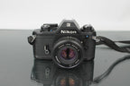Nikon EM + Nikon E 50mm 1:1.8 - Dutch|Thrift