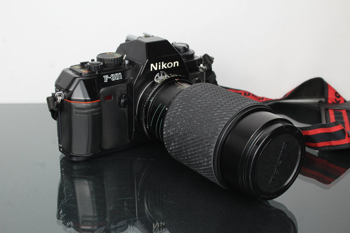Nikon F - 301 + 80 - 200mm 1:4.5 Tokina lens - Dutch|Thrift