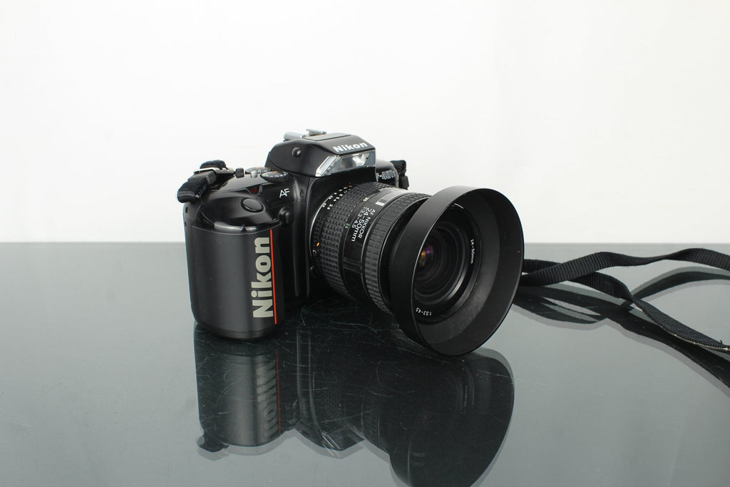Nikon F - 401x + AF Nikkor 24 - 50mm 1:3.3 - 4.5 lens (F mount) - Dutch|Thrift