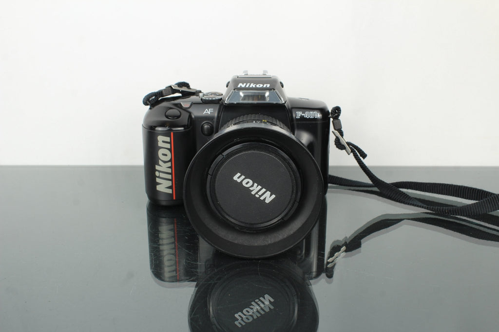 Nikon F - 401x + AF Nikkor 24 - 50mm 1:3.3 - 4.5 lens (F mount) - Dutch|Thrift