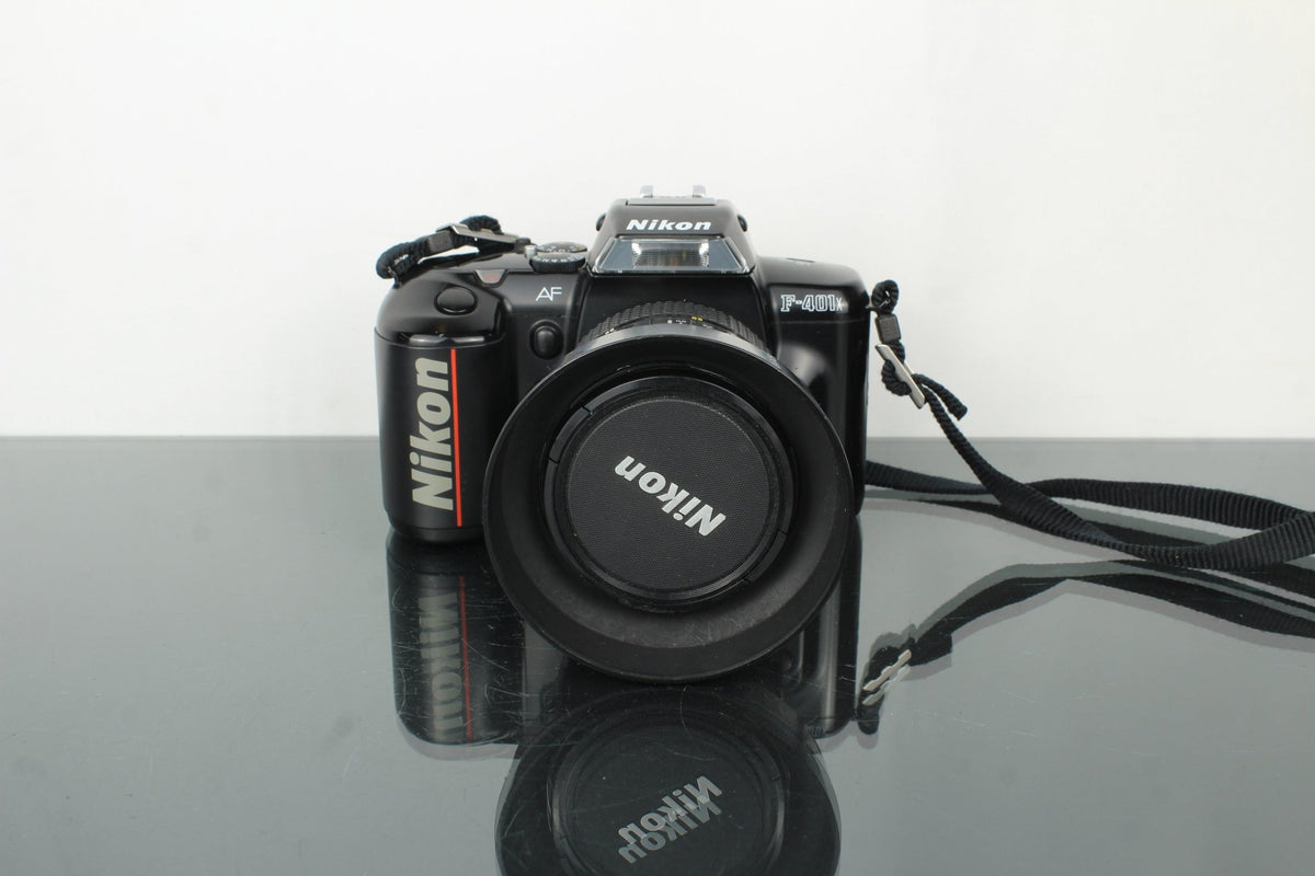 Nikon F - 401x + AF Nikkor 24 - 50mm 1:3.3 - 4.5 lens (F mount) - Dutch|Thrift