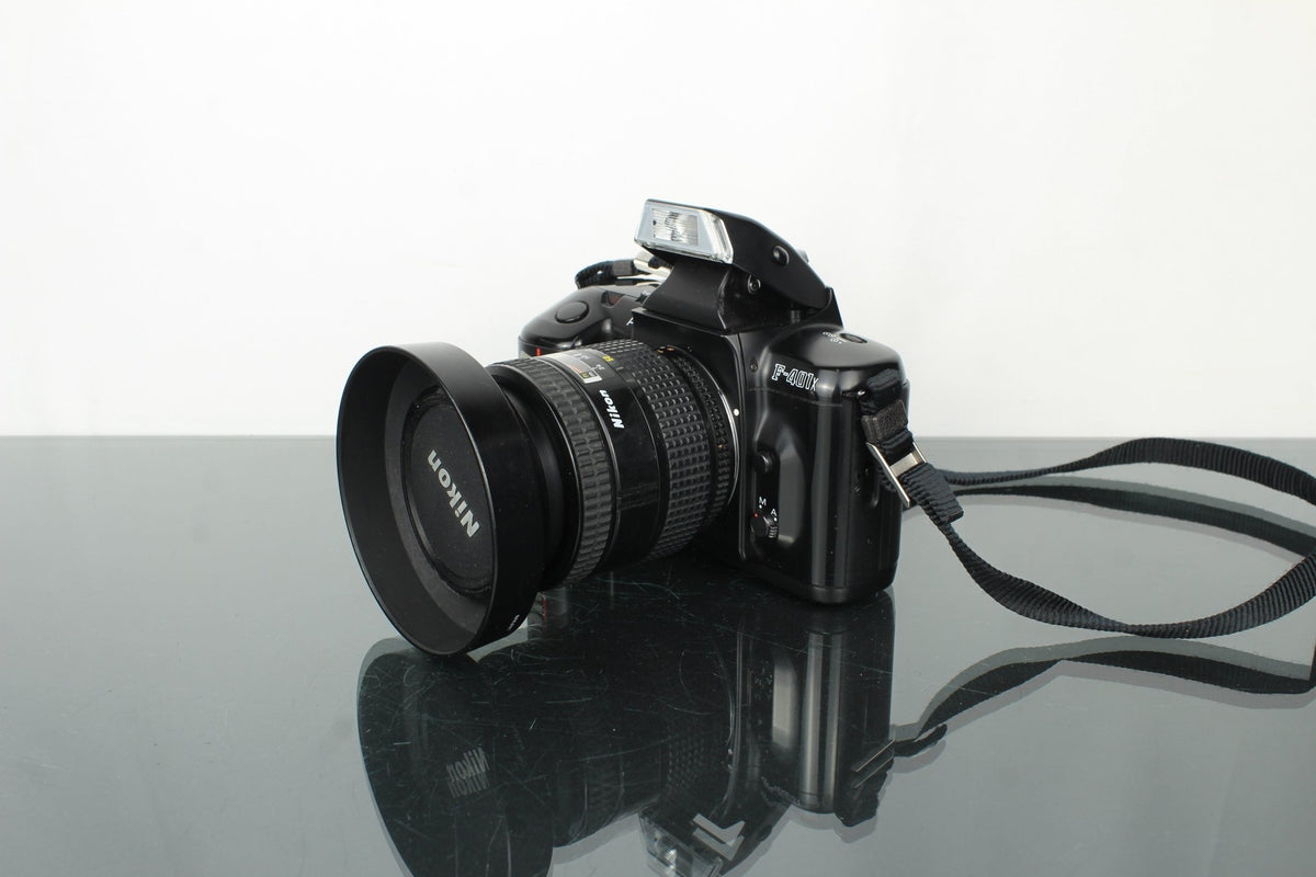 Nikon F - 401x + AF Nikkor 24 - 50mm 1:3.3 - 4.5 lens (F mount) - Dutch|Thrift