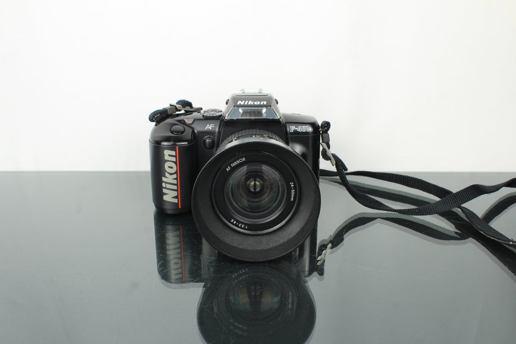 Nikon F - 401x + AF Nikkor 24 - 50mm 1:3.3 - 4.5 lens (F mount) - Dutch|Thrift