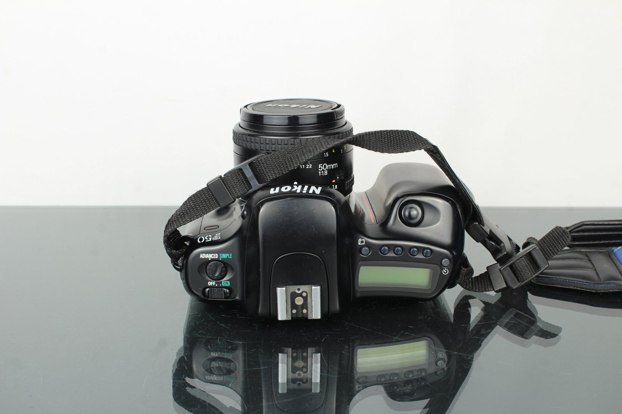 Nikon F50 + 50mm 1.8 Nikon AF lens - Dutch|Thrift