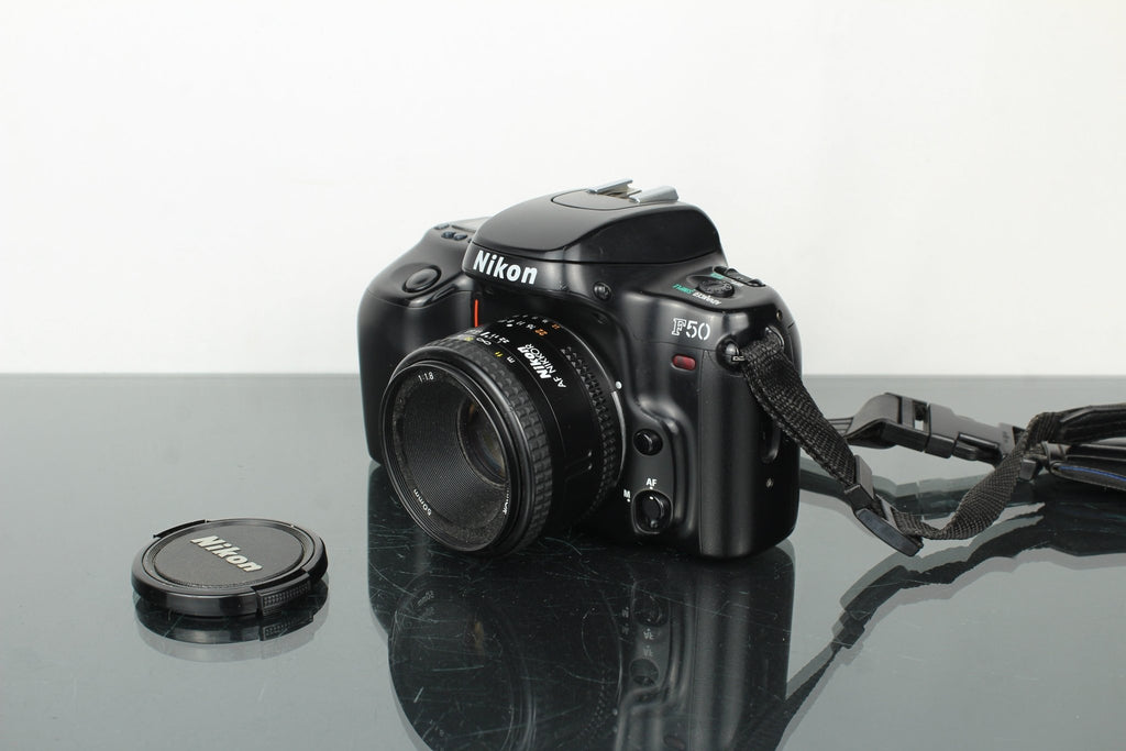 Nikon F50 + 50mm 1.8 Nikon AF lens - Dutch|Thrift