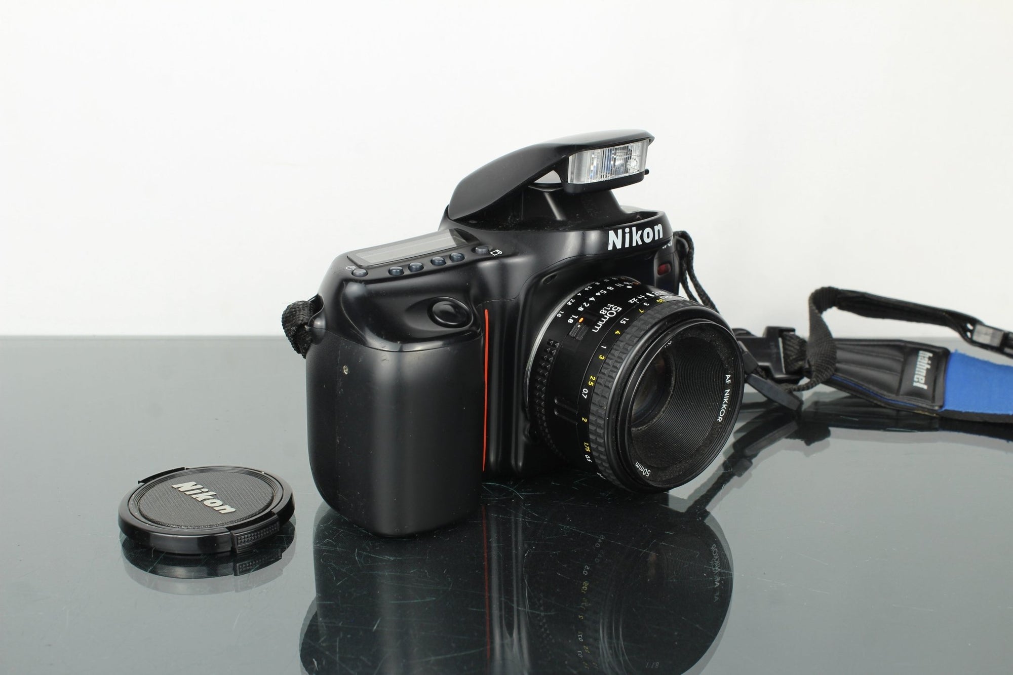 Nikon F50 + 50mm 1.8 Nikon AF lens - Dutch|Thrift