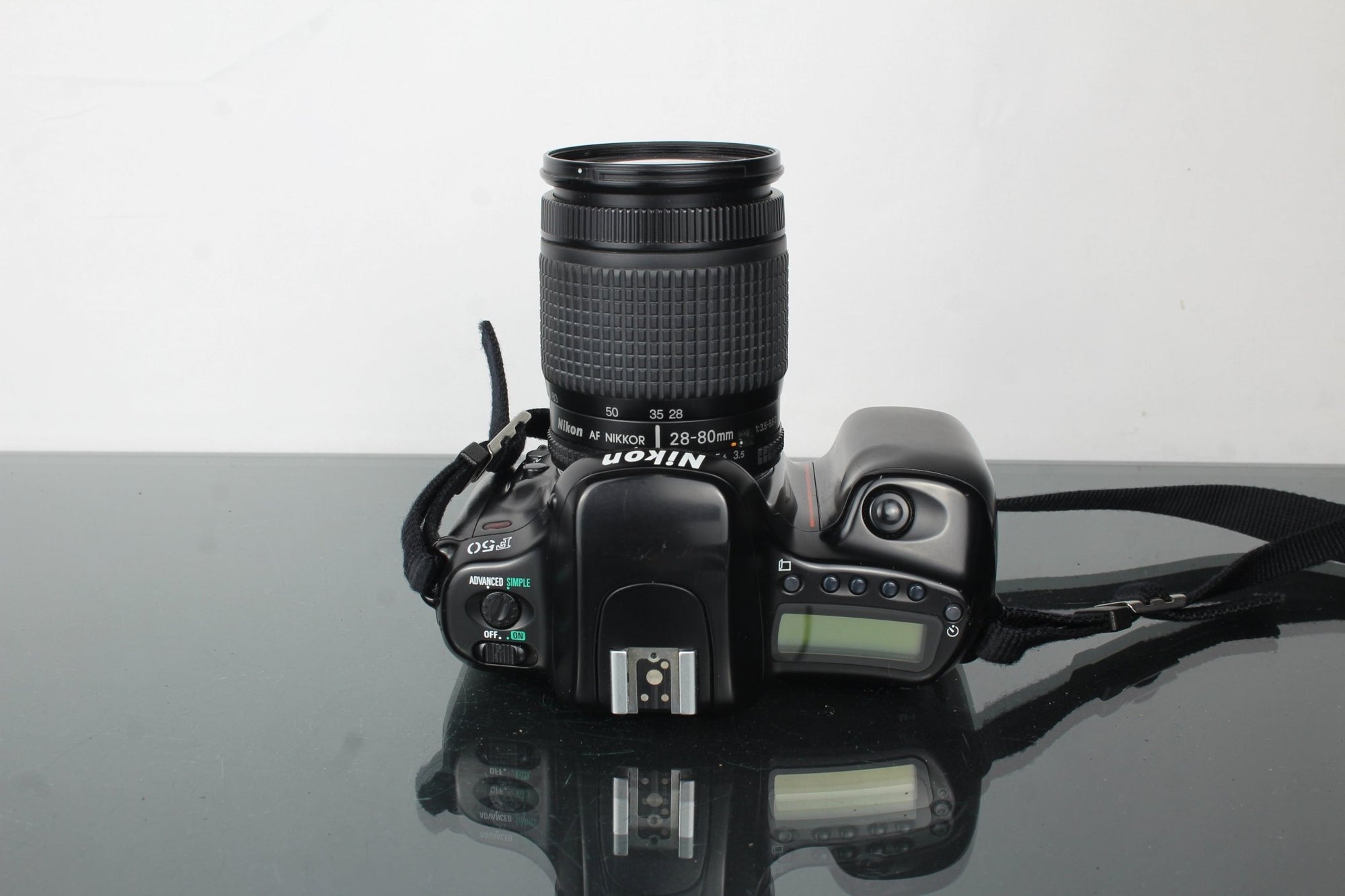 Nikon F50 + Nikkor 28 - 80mm 1:3.5 - 5.6 D lens - Dutch|Thrift