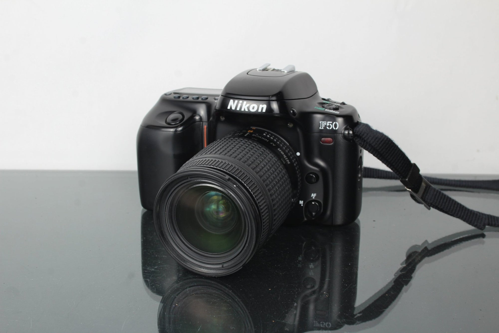 Nikon F50 + Nikkor 28 - 80mm 1:3.5 - 5.6 D lens - Dutch|Thrift