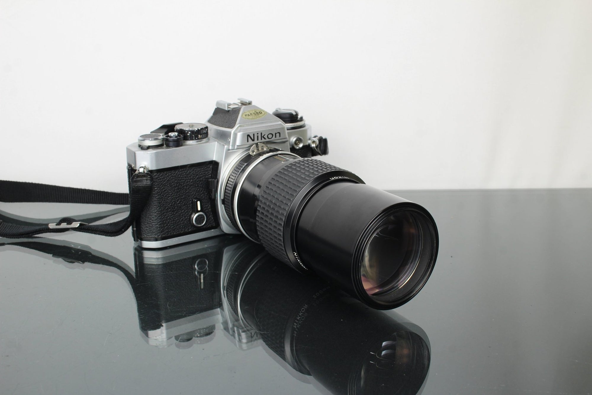 Nikon FE + Nikkor 200mm 1:4 lens - Dutch|Thrift