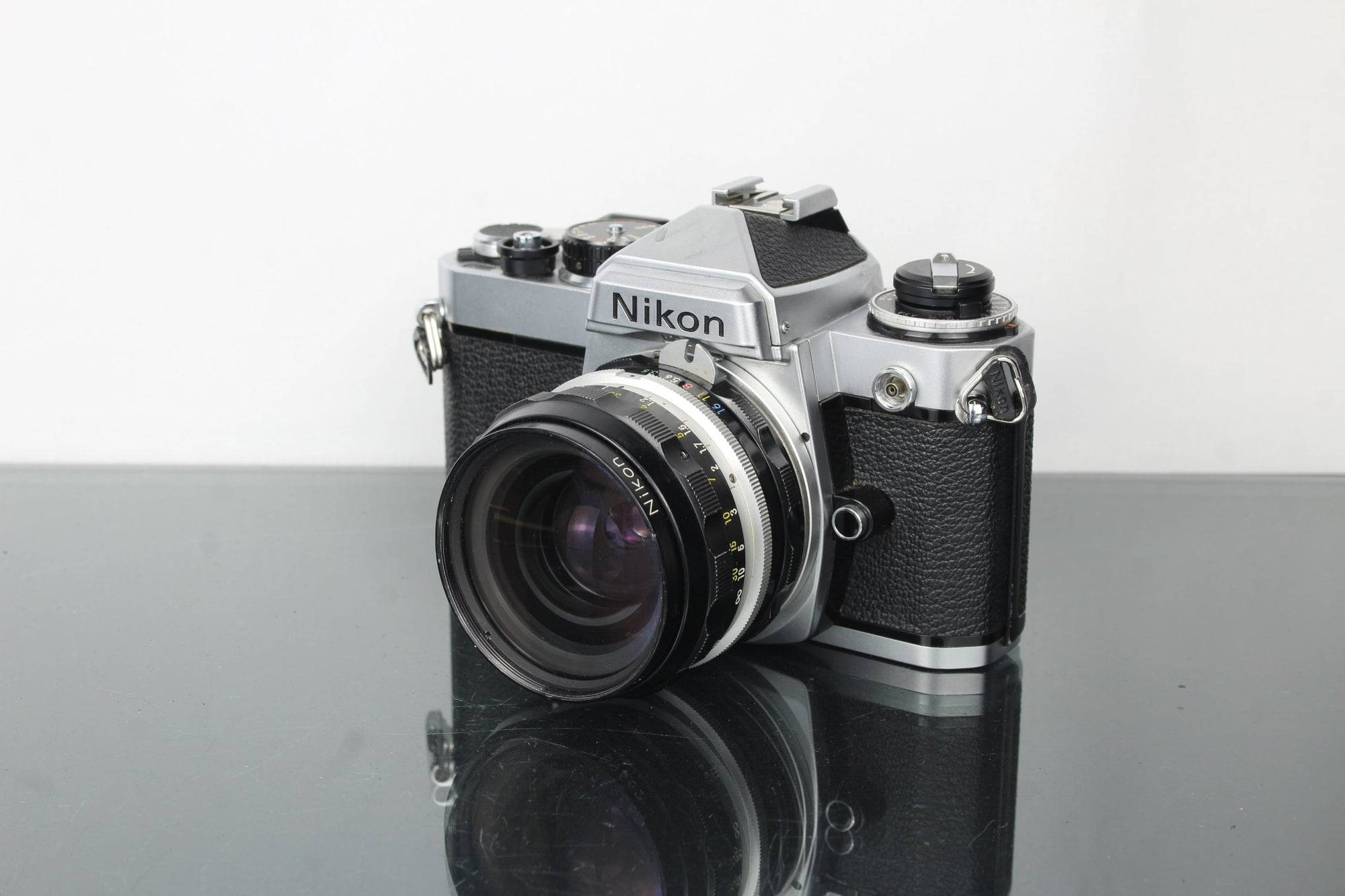 Nikon FE + Nikkor - H 28mm f/3.5 lens - Dutch|Thrift
