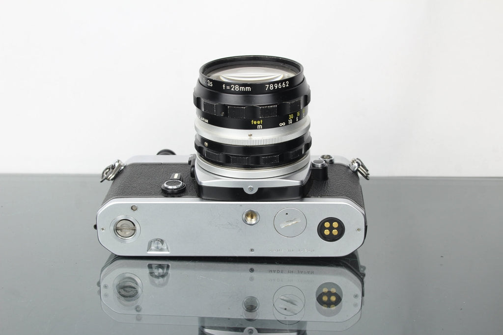 Nikon FE + Nikkor - H 28mm f/3.5 lens - Dutch|Thrift