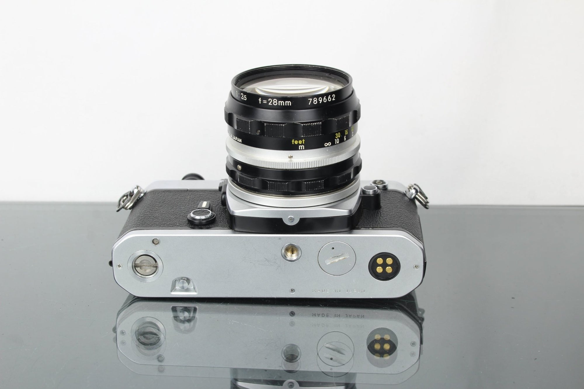 Nikon FE + Nikkor - H 28mm f/3.5 lens - Dutch|Thrift